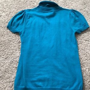 Blue shirt sleeve turtle neck shirt